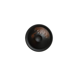 Top view of a Jianshui zitao Gaiwan tea bowl with hand-carved lotus leaf design and smooth matte finish