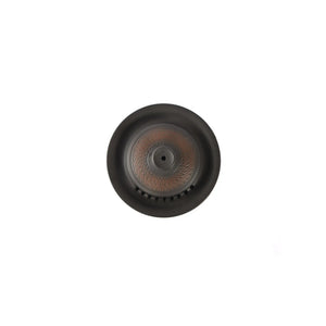 Top view highlighting the chattered texture and evenly spaced filter holes on a Jianshui zitao gaiwan lid