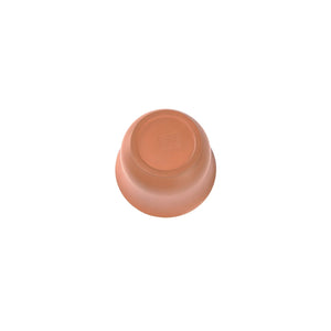 Bottom view of a Jianshui zitao red clay gaiwan showing a softly impressed maker’s mark and hand-finished base