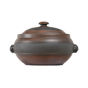 Handmade pottery steam pot featuring a chattering-carved band around the body.