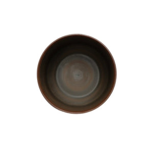 Top-down interior view of a Jianshui zitao tea canister (black) with smooth glazed interior