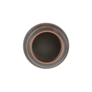 Interior top view of a handmade pottery tea canister with an unglazed, burnished surface.