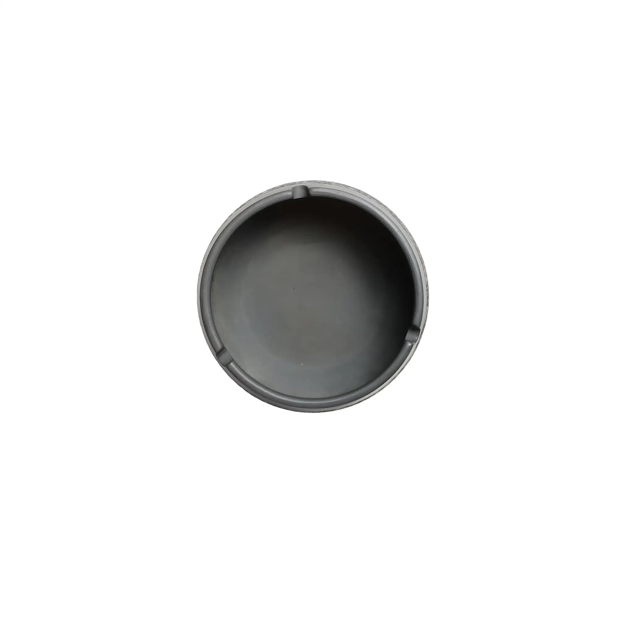Top view of a Jianshui zitao ashtray with smooth interior and notched edges