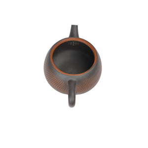 Interior view of PorSva No.40 Hanwa clay teapot displaying natural unglazed clay interior