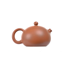 Right side view of PorSva No.50 plain red clay teapot showing clean minimalist form