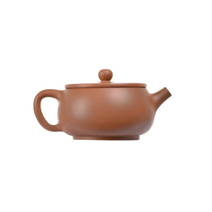 Right side view of PorSva No.52 plain red clay teapot showing clean minimalist form