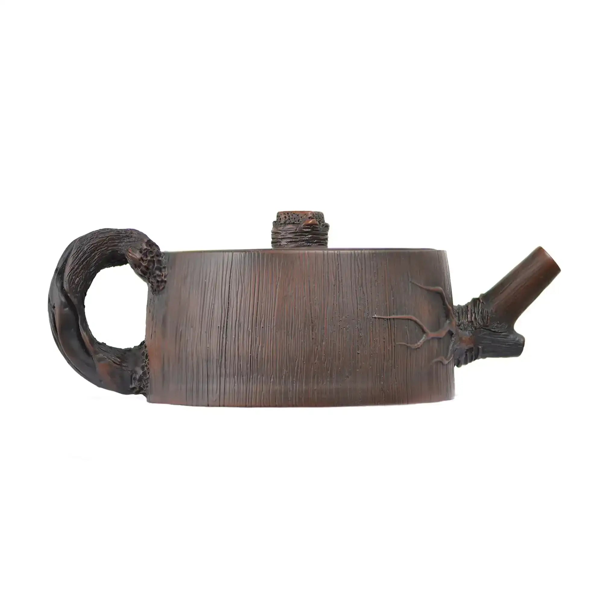 Right side view of PorSva No.53 root-style clay teapot highlighting organic branch-inspired form