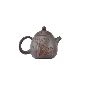 Handcrafted clay teapot No.6 featuring bamboo carved detailing and unglazed finish