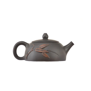 Side view of clay teapot No.17 showing raised bamboo relief design