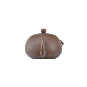 Back view of handcrafted clay teapot No.21 featuring Bodhi pattern and relief details