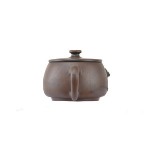 Back view of handcrafted clay teapot No.22 featuring Bodhi pattern and relief detail
