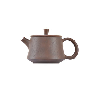 Side view of clay teapot No.9 with Bodhi pattern carving and traditional form