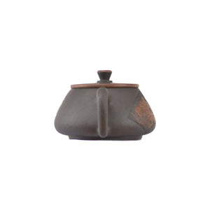 Back view of handcrafted clay Shipiao teapot No.23 featuring Bodhi pattern and relief detail