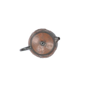 Top view of clay teapot No.31 showing lid shape and lotus carving detail style 2