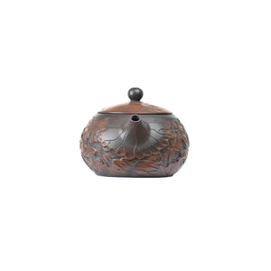 Front view of clay teapot No.31 showing detailed full lotus carving style 2