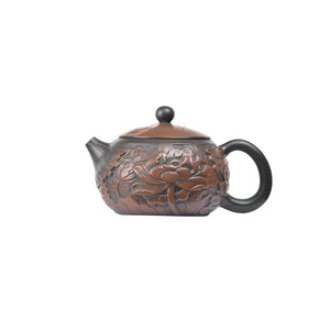 Side view of handcrafted clay teapot No.31 with full lotus carving pattern style 2