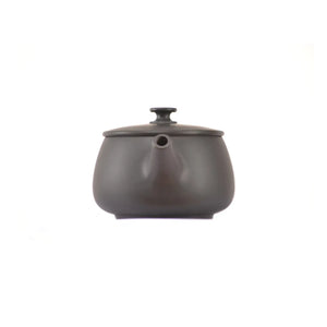 Clay teapot No.2 showing rounded handcrafted form and natural clay texture