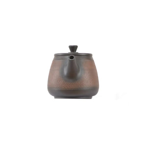 Handcrafted clay teapot No.12 featuring a jumping knife texture and unglazed finish