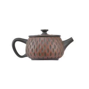 Alternate side view of clay teapot No.13 with meteor pattern texture