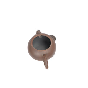 Top view of clay teapot No.21 highlighting lid shape and lotus pod relief detail