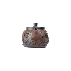Front view of PorSva No.33 Hanwa fully carved dragon clay teapot featuring detailed dragon relief
