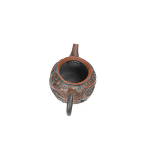Interior view of PorSva No.33 Hanwa clay teapot displaying natural clay texture and pouring structure
