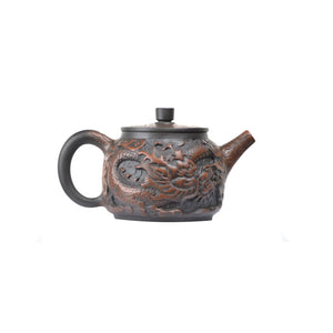 Right side view of PorSva No.33 Hanwa fully carved dragon clay teapot showing continuous relief carving