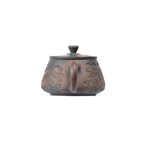 Back view of PorSva No.34 Shipiao phoenix clay teapot featuring sculpted phoenix body details