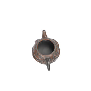 Interior view of PorSva No.35 Shipiao clay teapot displaying natural clay surface and pouring structure