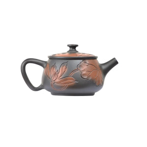 Right side view of PorSva No.39 Hanwa lotus carved teapot showing delicate engraved floral lines