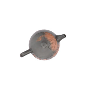 Top view of PorSva No.39 Hanwa lotus line-carved clay teapot showing lid structure