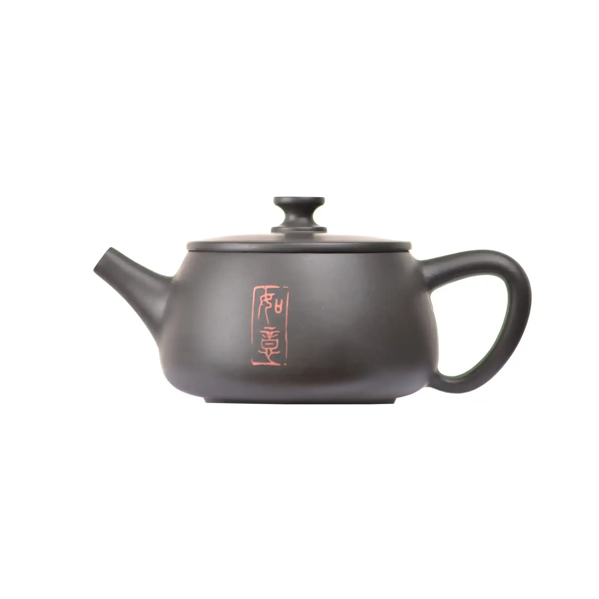Left side view of PorSva No.41 Hanwa clay teapot featuring carved Chinese calligraphy with red seal stamp
