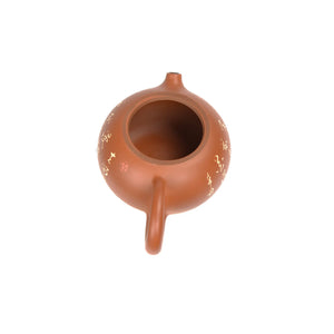 Interior view of PorSva No.42 Xishi clay teapot showing natural unglazed clay interior