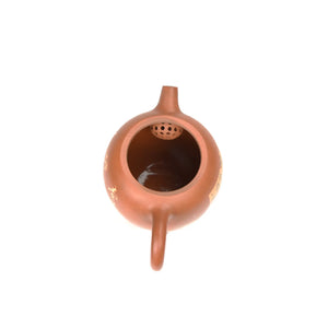 Interior view of PorSva No.49 red clay teapot showing natural unglazed clay interior