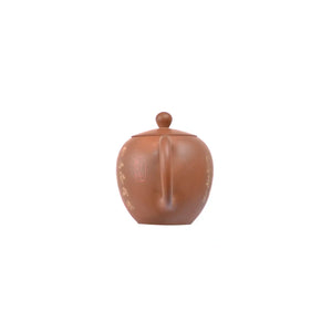 Back view of PorSva No.51 red clay teapot showing smooth natural clay surface