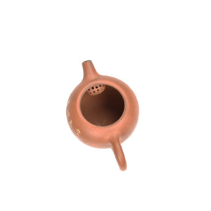 Interior view of PorSva No.51 red clay teapot showing natural unglazed interior