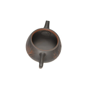 Open view of clay teapot No.8 showing natural clay interior and pouring structure
