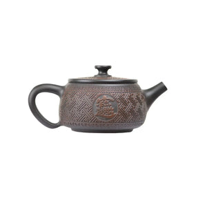 Right side view of PorSva No.37 Hanwa Fu character clay teapot showing clean machine-carved detail and structured form
