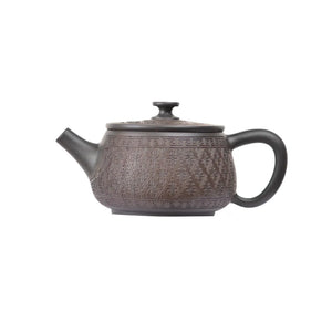 Left side view of PorSva No.38 Hanwa clay teapot featuring engraved decorative pattern style 3