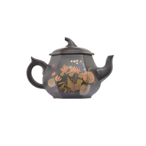 Right side view of PorSva No.56 clay teapot showing detailed floral and plant carving