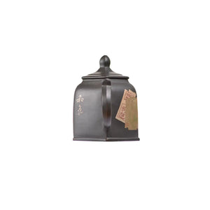 Back view of PorSva No.57 hexagonal clay teapot highlighting geometric six-sided structure