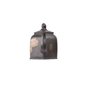 Front view of PorSva No.57 hexagonal clay teapot featuring calligraphy scroll style motif