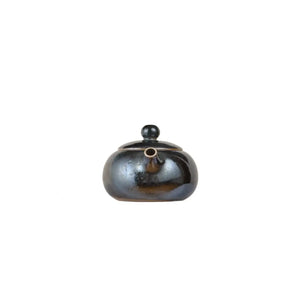 Front view of PorSva No.61 wood-fired clay teapot showing natural kiln firing marks