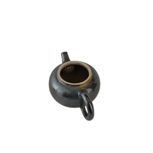Interior view of PorSva No.62 wood-fired clay teapot showing natural unglazed interior