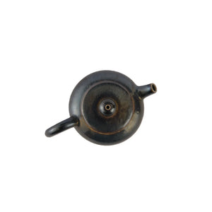 Top view of PorSva No.62 wood-fired clay teapot showing lid structure and firing texture