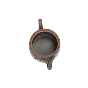 Interior view of PorSva No.53 clay root-style teapot showing natural unglazed interior