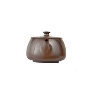 Front view of PorSva No.44 wood-fired clay teapot style 1 with natural kiln-fired surface