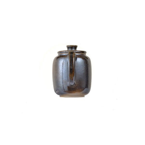Back view of PorSva No.66 wood-fired clay teapot showing natural firing variations