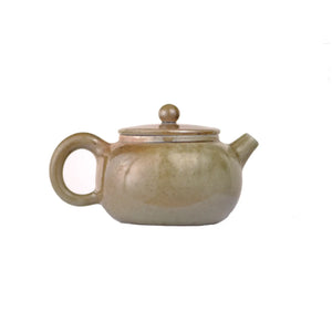 Right side view of PorSva No.47 wood-fired teapot highlighting unique natural firing marks