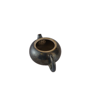 Interior view of PorSva No.61 wood-fired clay teapot showing natural unglazed interior